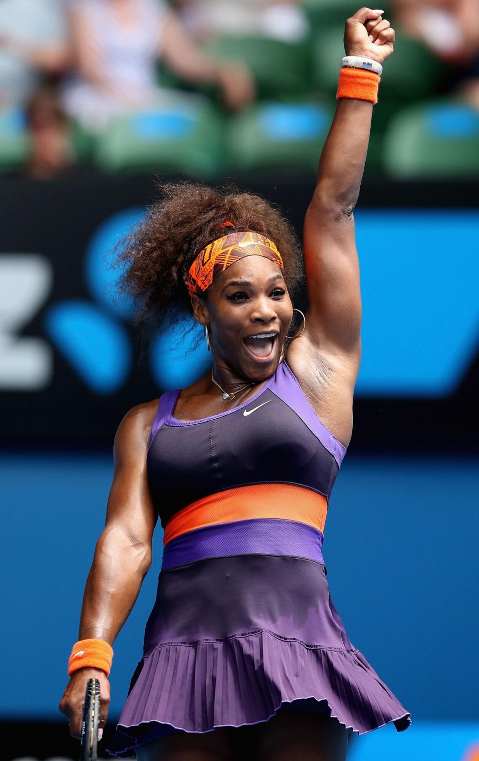 Serena Williams of the United States of America celebrates winning her second round match against Garbine Muguruza of Spain during day four of the 2013 Australian Open at Melbourne Park on January 17, 2013 in Melbourne, Australia