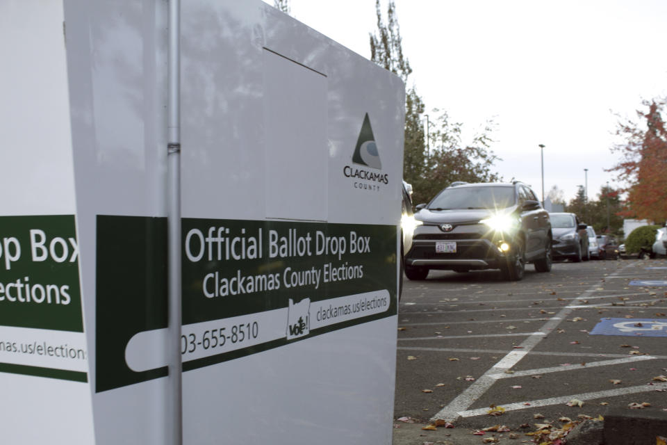 Voters in Clackamas County, Ore., cast ballots just a few hours before the 8 p.m. deadline at the elections offices in Oregon City, Oregon on Tuesday, Nov. 8, 2022. A large part of the county is in Oregon's newly redrawn 5th Congressional District, where Republican Lori Chavez-DeRemer and Democrat Jamie McLeod-Skinner are in a neck-and-neck race for an open seat that's been targeted by the GOP. Voters there said gas prices and inflation were their top concerns. (AP Photo/Gillian Flaccus)