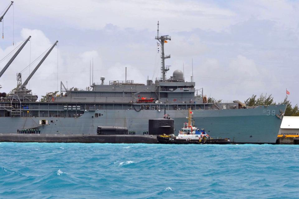 The US Navy's submarine tender USS <em>Emory S. Land</em> with the <em>Ohio</em> class guided missile submarine USS <em>Georgia</em> alongside it. <em>USN</em>