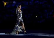 <p>Supermodel Gisele Bundchen walks as The Girl From Ipanema during the Bossa segment during the Opening Ceremony of the Rio 2016 Olympic Games at Maracana Stadium on August 5, 2016 in Rio de Janeiro, Brazil. (Photo by Jamie Squire/Getty Images) </p>