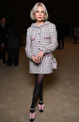 <p>Stephane Cardinale - Corbis/Corbis via Getty Images</p> Lucy Boynton attends the Chanel Haute Couture Spring/Summer 2024 show on Jan. 23