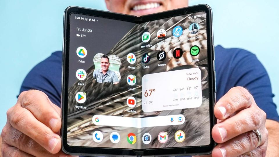 Google Pixel Fold half-folded in hand