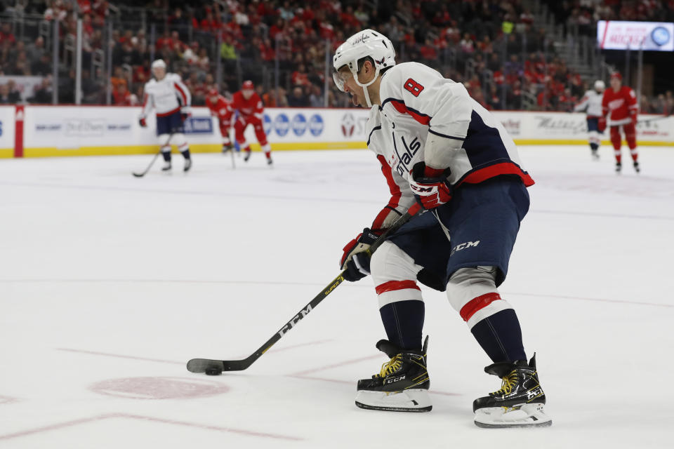 Washington Capitals left wing Alex Ovechkin scores an empty-net goal during the third period of the team's NHL hockey game against the Detroit Red Wings, Saturday, Nov. 30, 2019, in Detroit. (AP Photo/Carlos Osorio)