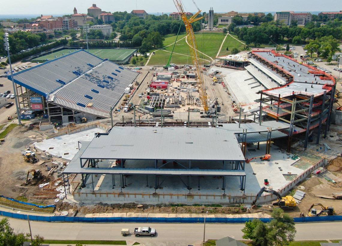 Construction crews continue work on David Booth Kansas Memorial Stadium on Thursday, July 25, 2024, in Lawrence. Crews are completely rebuilding the west side of the stadium, which should be complete in time for the start of the 2025 football season. A conference center is being added to the north bowl of the stadium. KU has not yet announced details for dates for any possible renovation of the East stands which is Phase Two of the renovation process.