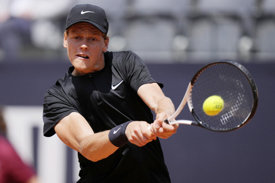 Italy's Jannik Sinner returns the ball to Australia's Thanasi Kokkinakis during their match at the Italian Open tennis tournament, in Rome, Friday, May 12, 2023. (AP Photo/Andrew Medichini)