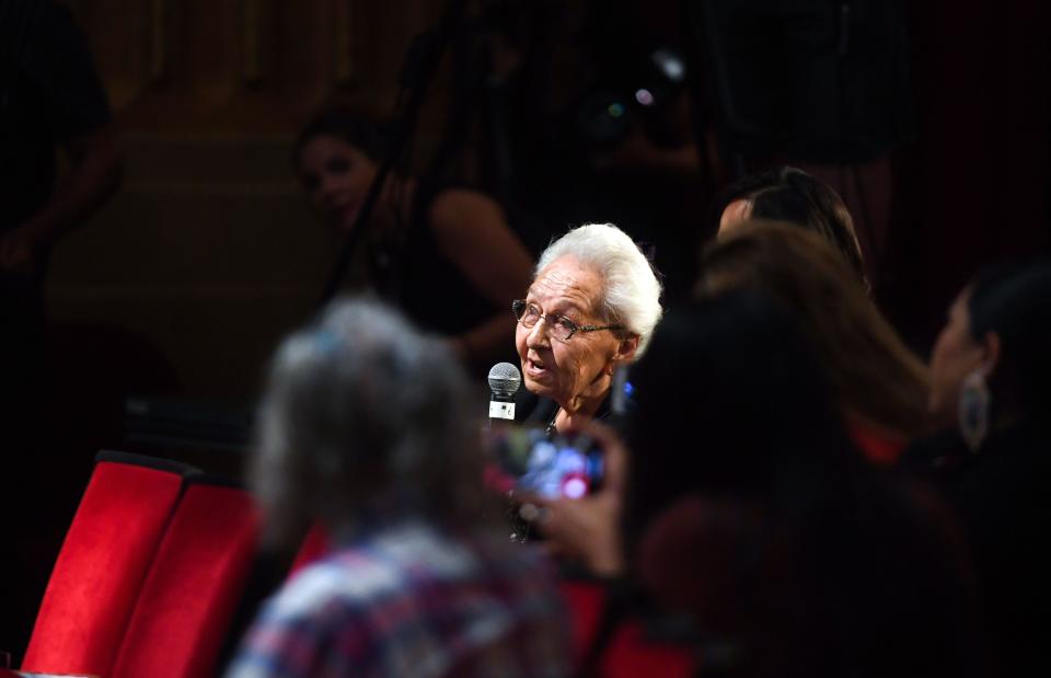 Marcella LeBeau, an elder from the Cheyenne River Sioux tribe, asks the first question of the Frank LaMere Native American Presidential Forum to presidential candidate Marianne Williamson from the audience on Monday, Aug. 19, 2019, at the Orpheum in Sioux City.