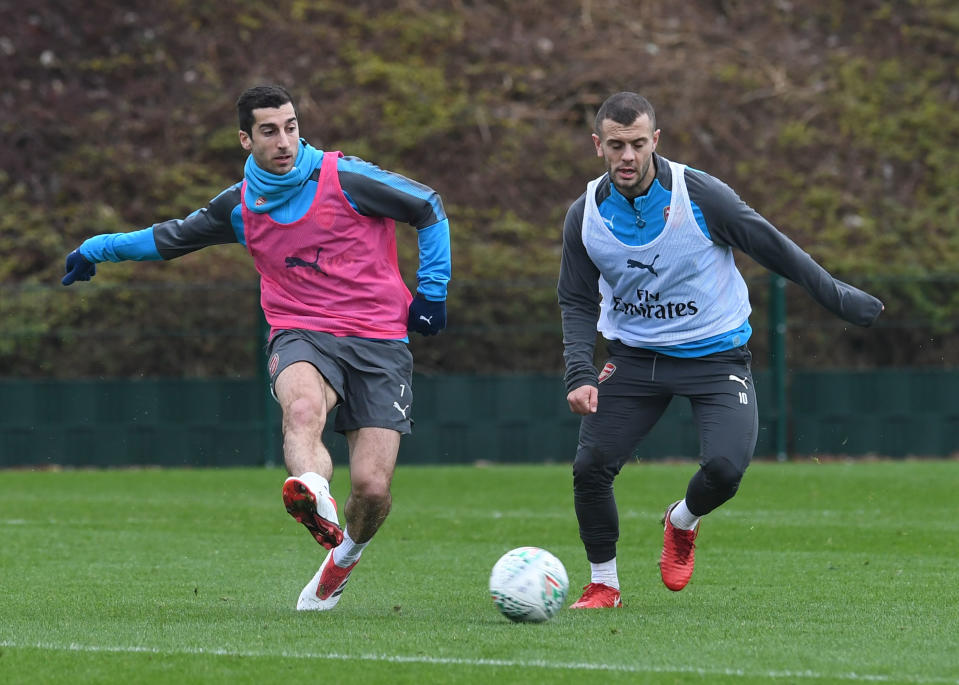 Henrikh Mkhitaryan and Jack Wilshere of Arsenal during a training session at London Colney on January 23, 2018 in St Albans, England