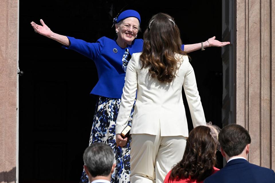 Queen Margrethe II of Denmark welcomes Denmark's Princess Isabella prior to her confirmation at Fredensborg Castle Church in Fredensborg, Denmark on April 30, 2022