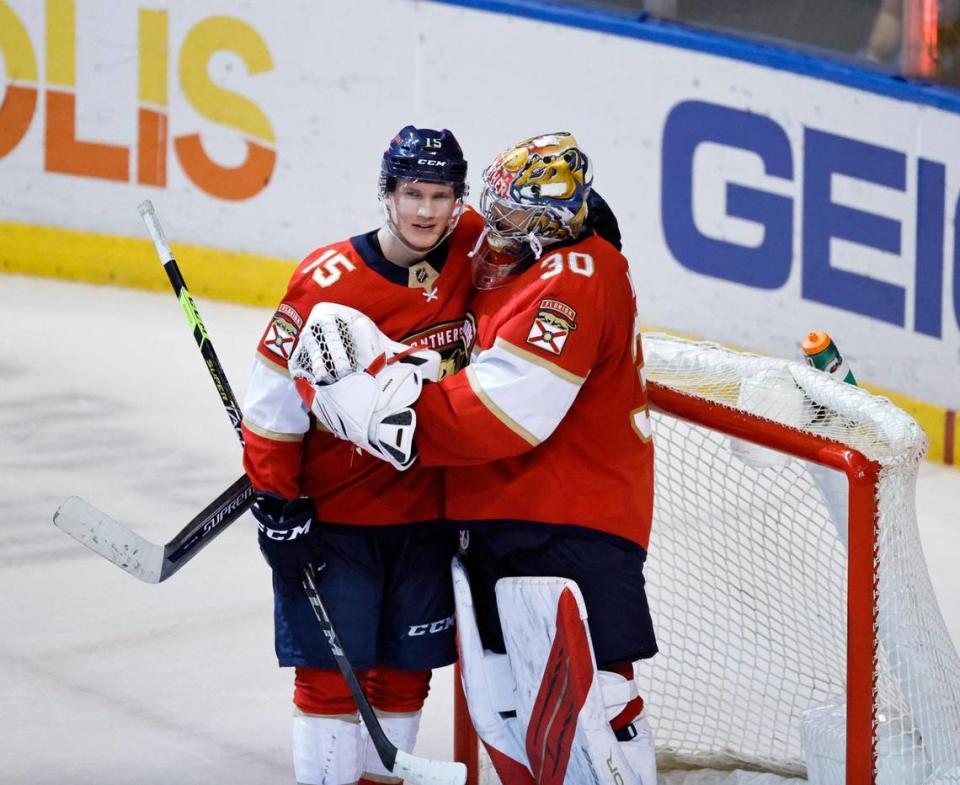 Florida Panthers players Anton Lundell (15) and Spencer Knight (30) celebrate their 4-1 win over the Vegas Golden Knights during an NHL game at the FLA Live Arena on Thursday, January 27, 2022 in Sunrise, Fl.