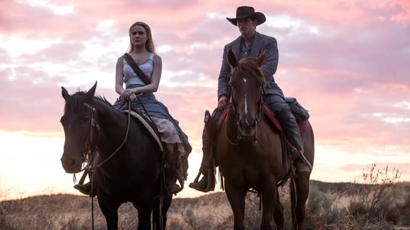 A scene of a man and a woman on horseback from HBO's Westworld.