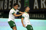 Portland Timbers midfielder Sebastian Blanco, right, celebrates his goal in extra time to give the Timbers a 2-2 draw with the Colorado Rapids durin an MLS soccer match Wednesday, Sept. 15, 2021, in Portland, Ore. (Sean Meagher/The Oregonian via AP)