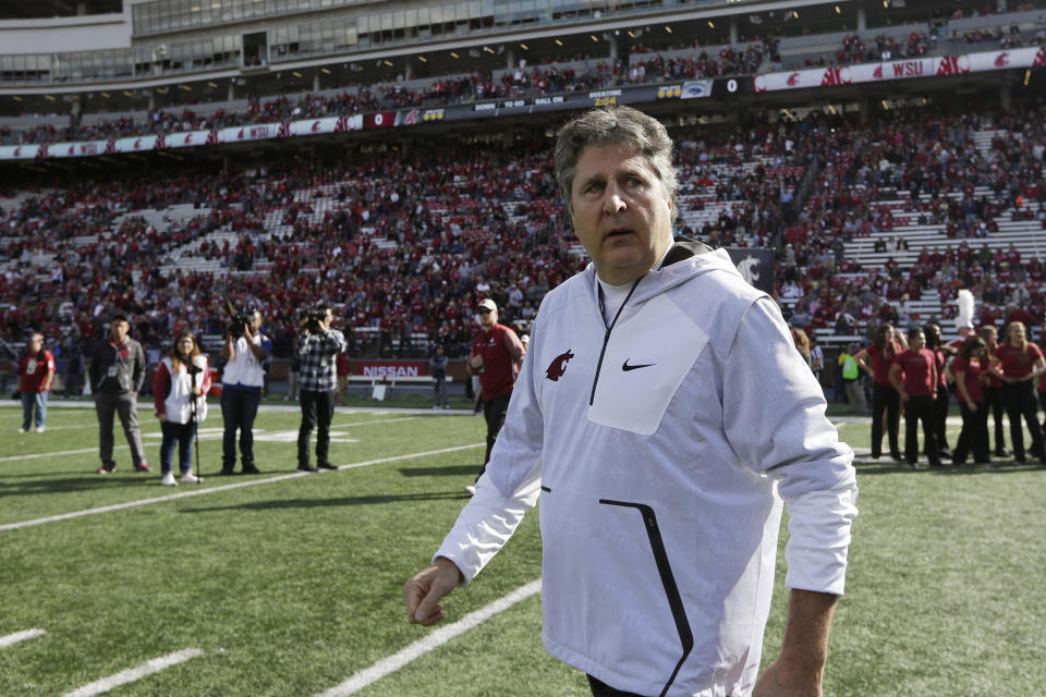 Washington State head coach Mike Leach walks on the field before an NCAA college football game against Nevada in Pullman, Wash., Saturday, Sept. 23, 2017. (AP Photo/Young Kwak)