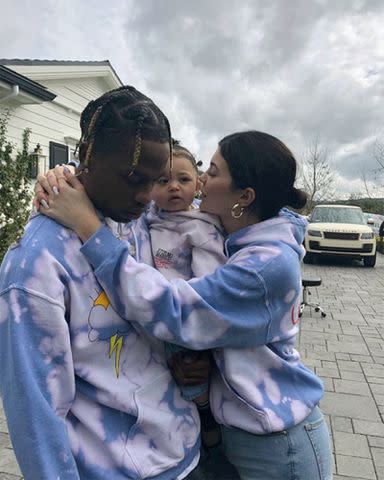 Kylie Jenner/Instagram Travis Scott, Kylie Jenner and Stormi Webster hugging.