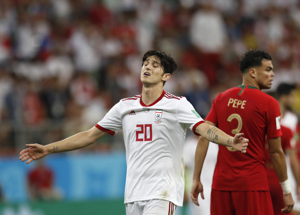 Iran’s Sardar Azmoun is retiring from international competition because fan criticism has made his mother physically ill. (AP Photo/Pavel Golovkin)