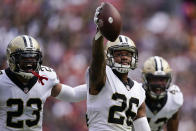 New Orleans Saints cornerback P.J. Williams (26) celebrates after intercepting a pass attempt in the second half of an NFL football game against the Washington Football Team, Sunday, Oct. 10, 2021, in Landover, Md. (AP Photo/Alex Brandon)