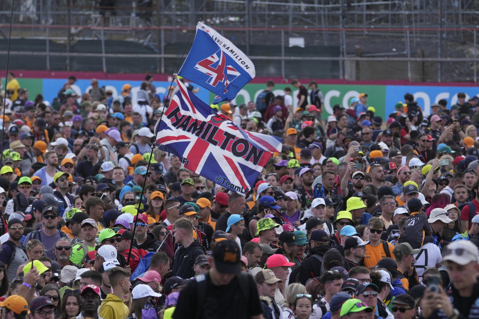 Supporters cheer after the British Formula One Grand Prix race at the Silverstone racetrack, Silverstone, England, Sunday, July 9, 2023. (AP Photo/Luca Bruno)