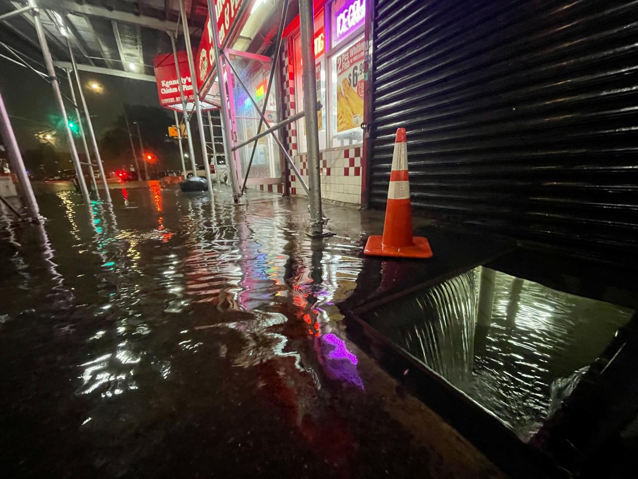 Rainfall from Hurricane Ida flood the basement of a Kennedy Fried Chicken fast food restaurant on Sept. 1, 2021, in the Bronx borough of New York City.