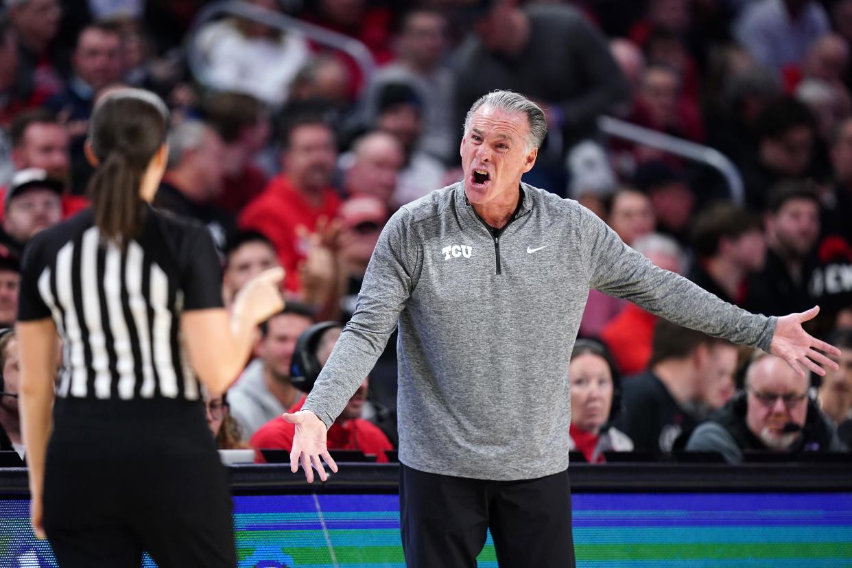 TCU Horned Frogs head coach Jamie Dixon argues with an official in the overtime period of UC's 81-77 win Jan. 16.