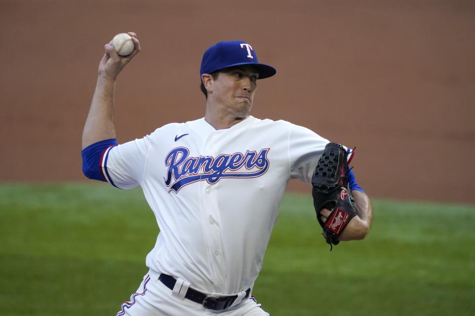 Texas Rangers starting pitcher Kyle Gibson throws to the Houston Astros in the first inning of a baseball game in Arlington, Texas, Saturday, Sept. 26, 2020. (AP Photo/Tony Gutierrez)