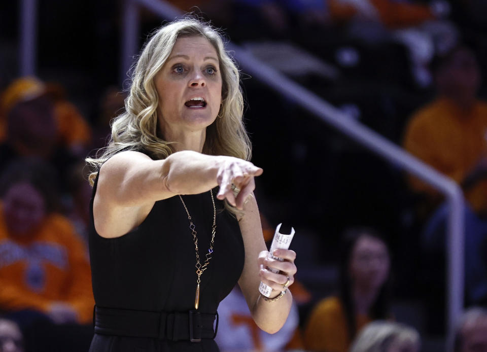 FILE - Tennessee head coach Kellie Harper yells to her players during the second half of an NCAA college basketball game against Arkansas, Jan. 31, 2022, in Knoxville, Tenn. The Lady Vols also haven't been ranked since late November despite starting the season ranked fifth. They can take a step toward ending a couple of those Thursday, Jan. 26, 2023 when No. 5 UConn visits for the latest game in the rivalry between women’s basketball’s most storied programs. (AP Photo/Wade Payne, File)