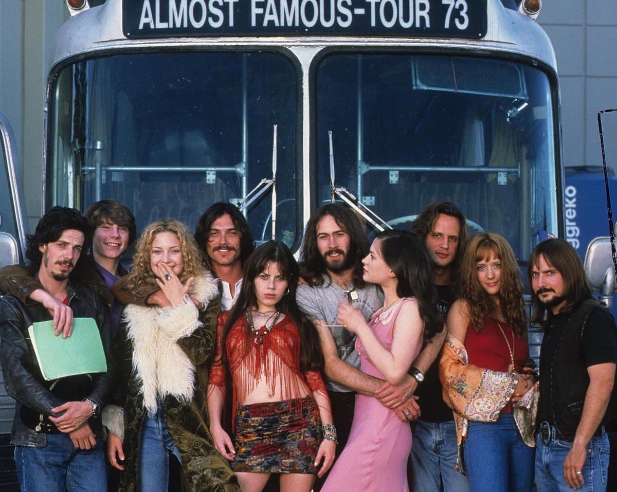 The lead cast, including Noah Taylor, Patrick Fugit, Kate Hudson, Billy Crudup, Fairuza Balk, Jason Lee and Anna Paquin, in front of Stillwater’s tour bus (Rex)