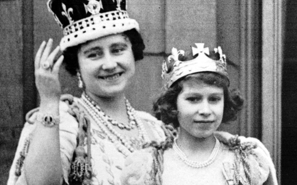 Pictured with her mother at her parents' coronation, the 11-year-old Elizabeth was likened to Queen Mary, her grandmother - PA