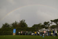 A rainbow can be seen over the 17th tee of the Pebble Beach Golf Links before players resumed play in the third round of the AT&T Pebble Beach Pro-Am golf tournament in Pebble Beach, Calif., Sunday, Feb. 5, 2023. (AP Photo/Godofredo A. Vásquez)