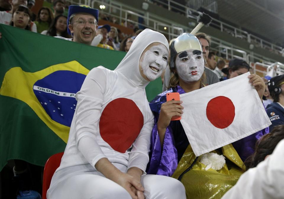<p>Japanese fans watch the artistic gymnastics men’s individual all-around final at the 2016 Summer Olympics in Rio de Janeiro, Brazil, Wednesday, Aug. 10, 2016. (AP Photo/Jae C. Hong) </p>