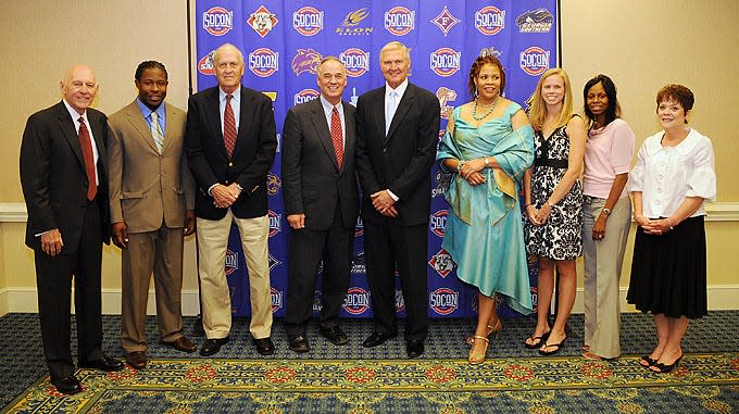 Left to right, Dick Groat, Adrian Peterson, Frank Selvy, Sam Huff, Jerry West, Valorie Whiteside, Megan Dunigan, Melissa Morrison Howard, Barbara Crews, daughter of Charlie "Choo Choo" Justice pose for a photo before a ceremony for the first Southern Conference Hall of Fame class, Monday, May 4, 2009.