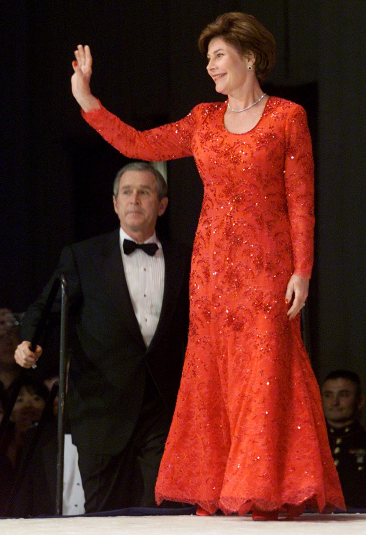 The new first lady acknowledges supporters at one of the 2001 inaugural balls.