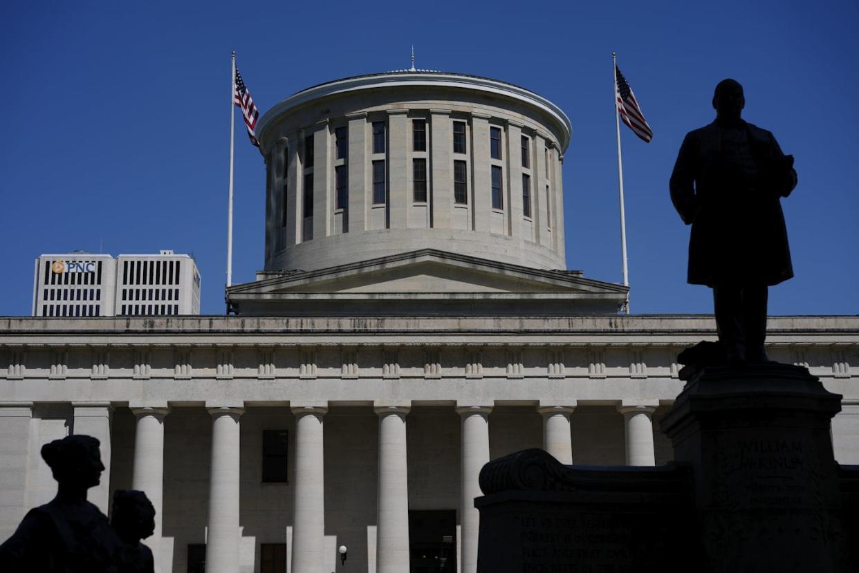 The William McKinley Monument, silhouetted on the west side of the Ohio Statehouse, on April 15, 2024, in Columbus, Ohio. <a href="https://newsroom.ap.org/detail/Election2024BidenBallotOhio/303abab4c1ec41fdad908404c8d509f6/photo?Query=Biden%20Ohio&mediaType=photo,video,graphic,audio&sortBy=arrivaldatetime:desc&dateRange=Anytime&totalCount=3280&currentItemNo=9" rel="nofollow noopener" target="_blank" data-ylk="slk:AP Photo/Carolyn Kaster, File;elm:context_link;itc:0;sec:content-canvas" class="link ">AP Photo/Carolyn Kaster, File</a>