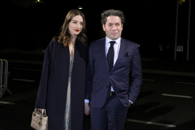 Gustavo Dudamel and his wife Maria Valverde pose together at the