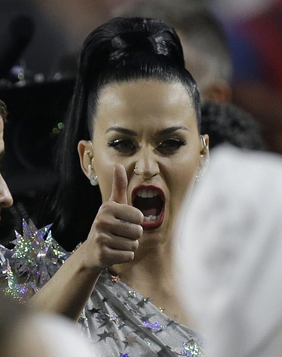 Katy Perry gives a thumbs up after performing during halftime of NFL Super Bowl XLIX football game between the Seattle Seahawks and the New England Patriots on Sunday, Feb. 1, 2015, in Glendale, Ariz. (AP Photo/Brynn Anderson)