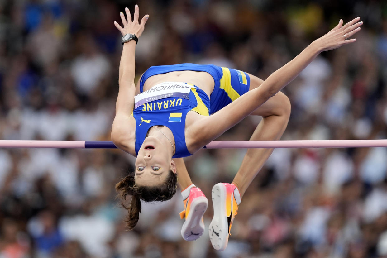 Yaroslava Mahuchikh, of Ukraine, competes in the women's high jump final at the Summer Olympics on Sunday.