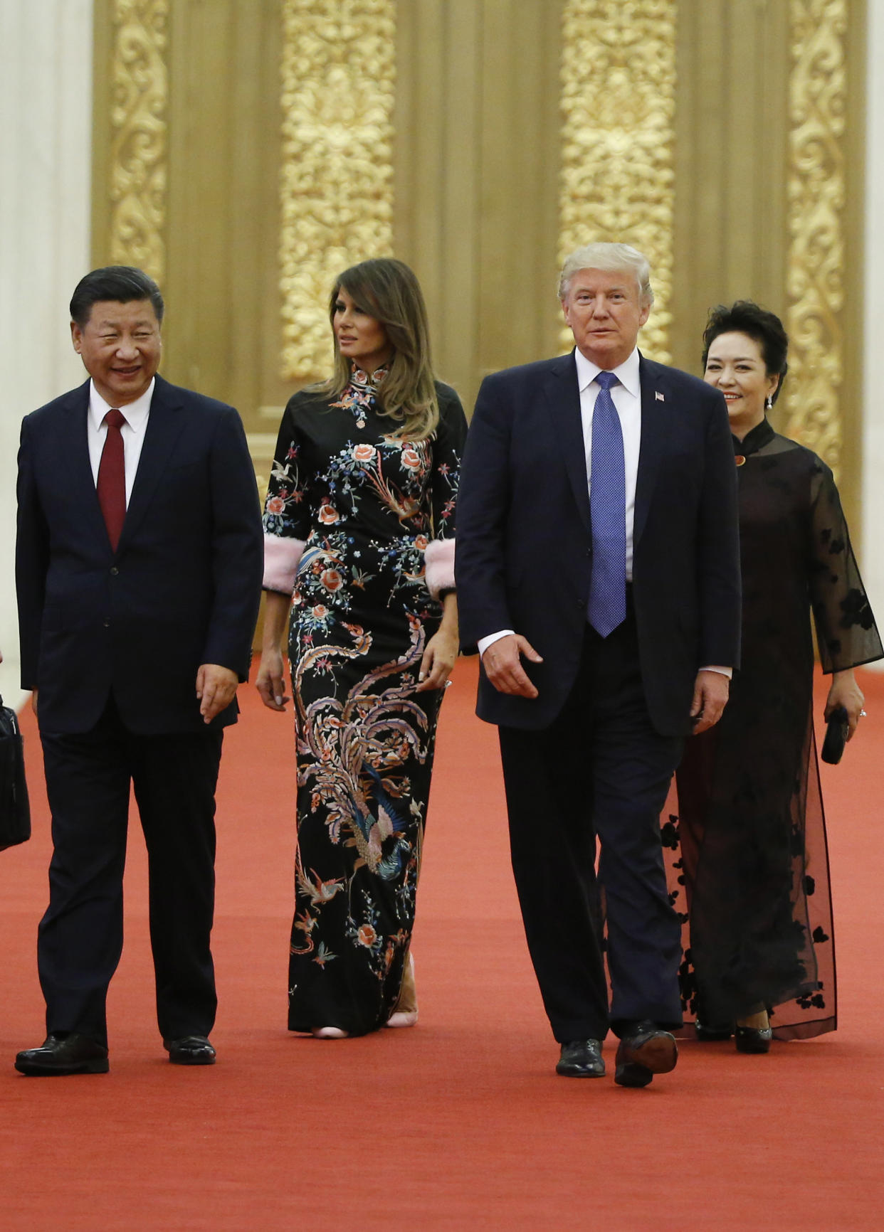 President Trump and first lady Melania Trump arrive for the state dinner with Chinese President Xi Jinping and China’s first lady, Peng Liyuan, at the Great Hall of the People in Beijing on Nov. 9. (Photo: Thomas Peter/Pool Photo via AP)