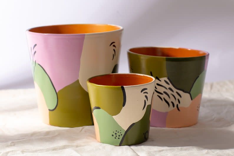 <p><strong>PepperPalm</strong></p><p>etsy.com</p><p><strong>$75.00</strong></p><p>Maybe already growing a small greenhouse out of their city apartment. In which case, these hand-painted terra cotta planter pots from Nashville-based Etsy vendor <a href="https://go.redirectingat.com?id=74968X1596630&url=https%3A%2F%2Fwww.etsy.com%2Fshop%2FPepperPalm%3Fref%3Dsimple-shop-header-name%26listing_id%3D732613574&sref=https%3A%2F%2Fwww.menshealth.com%2Ftechnology-gear%2Fg34445542%2Fbest-gifts-for-couples%2F" rel="nofollow noopener" target="_blank" data-ylk="slk:Pepper Palm;elm:context_link;itc:0;sec:content-canvas" class="link ">Pepper Palm</a> are a best-seller. Reviewers rave about how these arrive in perfect condition and quickly. </p>