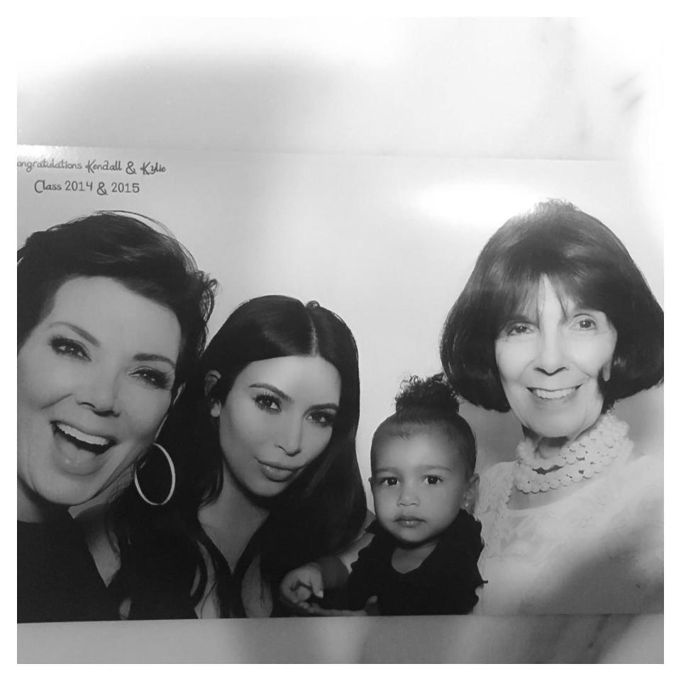 Does North West get her serious side from her mom, Kim Kardashian? The adorable 2-year-old posed for some family pictures at a surprise high school graduation party that radio host (and <em>Keeping Up With the Kardashians </em>executive producer) Ryan Seacrest threw for her aunts Kendall and Kylie Jenner. And you could say little Nori looks a lot like her mom, lip pout and all! Just take a look at the four generations of Kardashians in this photo, including Kim, her mom, Kris Jenner, and Kris' mom, Mary Jo Campbell. <strong> WATCH: North West Adorably Dances to 'Black Widow' </strong> And even though Kris and Mary Jo are all smiles, Kim and North have on their serious faces. In fact, when her mom, grandma and great-grandma all give her a kiss, she still chooses not to crack a smile! <strong> PICS: North West's 22 Cutest Photos </strong> North's father, Kanye West, joined his wife for a non-smiling snap too. He actually explained why he won't smile back in January at the The Daily Front Row's First Annual Fashion Los Angeles Awards. "Back when I was working on <em>Yeezus</em>, I saw this book from the 1800s and it was velvet-covered with brass and everything. I looked at all these people's photos and they look so real and their outfits were incredible and they weren't smiling," he told the crowd. "The paparazzi always come up to me, 'Why you not smiling?' and I think, not smiling makes me smile… When you see paintings in an old castle, people are not smiling cause it just wouldn't look as cool." <strong> WATCH: Sad Kanye Turns Happy In a Second! </strong> But ultimately, you could say that his wife brings out the best in him. There's that smile! It's no wonder we'll lose all hope in love if Kim and Kanye divorce. Check out the video below to see 10 more that restore our faith in love.