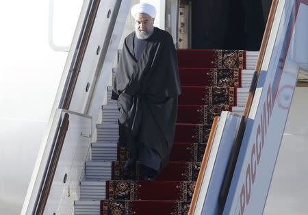 Iranian President Hassan Rouhani disembarks from a plane upon his arrival at Vnukovo International Airport in Moscow, Russia March 27, 2017. REUTERS/Maxim Shemetov