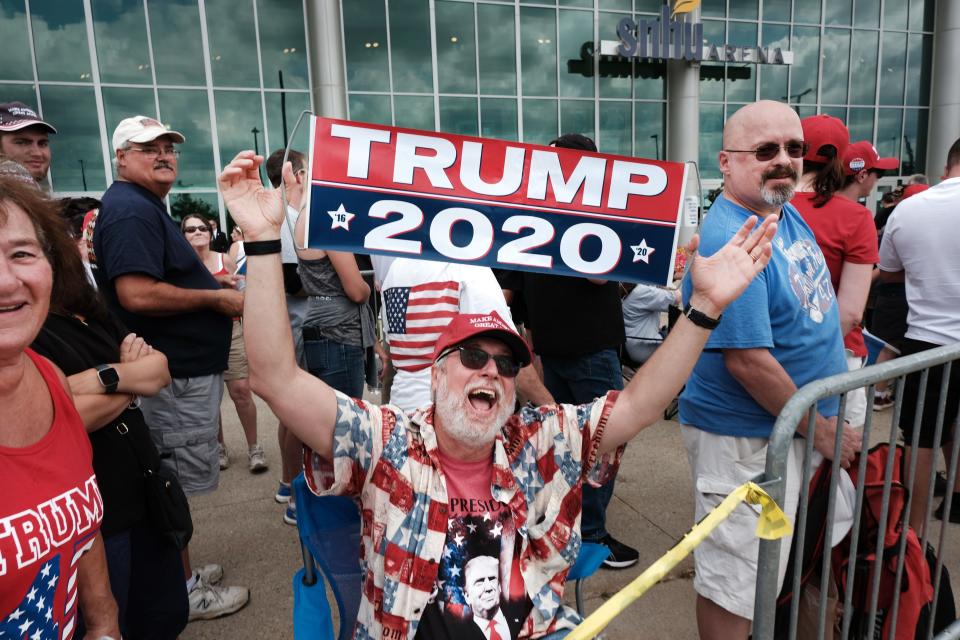 Donald Trump supporters gather outside of an arena in Manchester before a scheduled evening rally by Trump on August 15, 2019 in Manchester, New Hampshire.