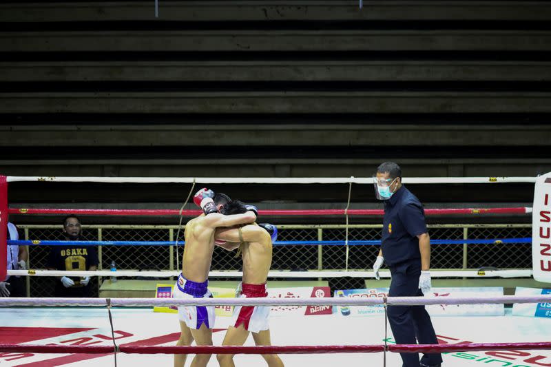 Muaythai boxers return to fight for the first time after temporary suspend due to the spread of the coronavirus disease (COVID-19) in Thailand