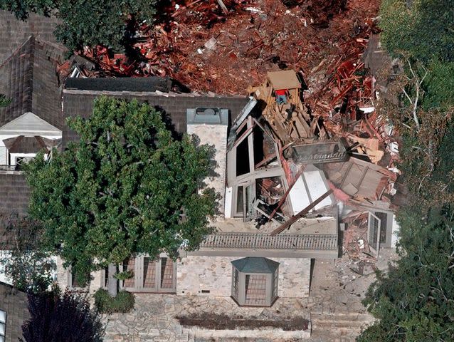 <p>Mark J. Terrill/AP</p> O.J. Simpson's former Brentwood home after it was demolished