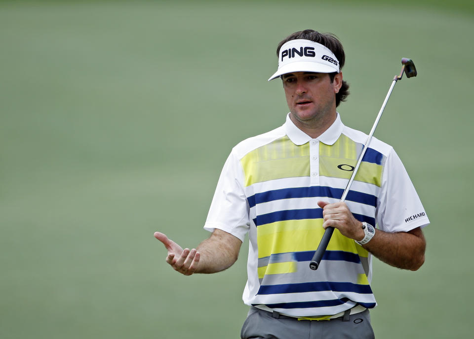 Bubba Watson walks down the 14th fairway during the second round of the Masters golf tournament Friday, April 11, 2014, in Augusta, Ga. (AP Photo/Matt Slocum)