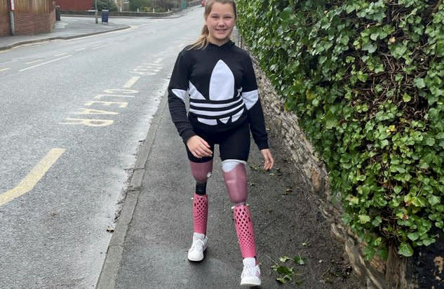 Maisie Catt. See SWNS story SWNNjab. An 11-year-old double leg amputee is paying tribute to her real-life hero Cpt Sir Tom Moore by walking an entire marathon in her garden in his memory. Last year Maisie Catt, who lost her legs to meningitis and septicemia, followed in the veterans heroic footsteps by walking 26 miles in her garden over the course of ten days. The schoolgirl will now do it all over again in tribute to national hero Cpt Sir Tom, who died from coronavirus on Tuesday after raising more than £30million for NHS charities. Masie is to walk a second marathon to raise money for charity YoungMinds to coincide with Children's Mental Health Week which runs between February 1 and 7.   