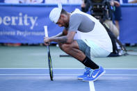 Nick Kyrgios, of Australia, pauses on the court after he beat Yoshihito Nishioka, of Japan, during a final at the Citi Open tennis tournament Sunday, Aug. 7, 2022, in Washington. Kyrgios won 6-4, 6-3.(AP Photo/Nick Wass)