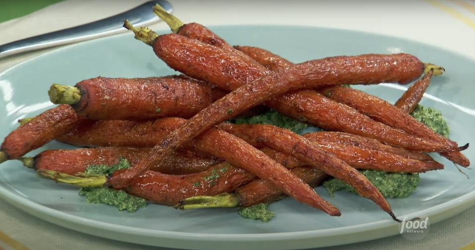 a plate of seasoned roasted carrots