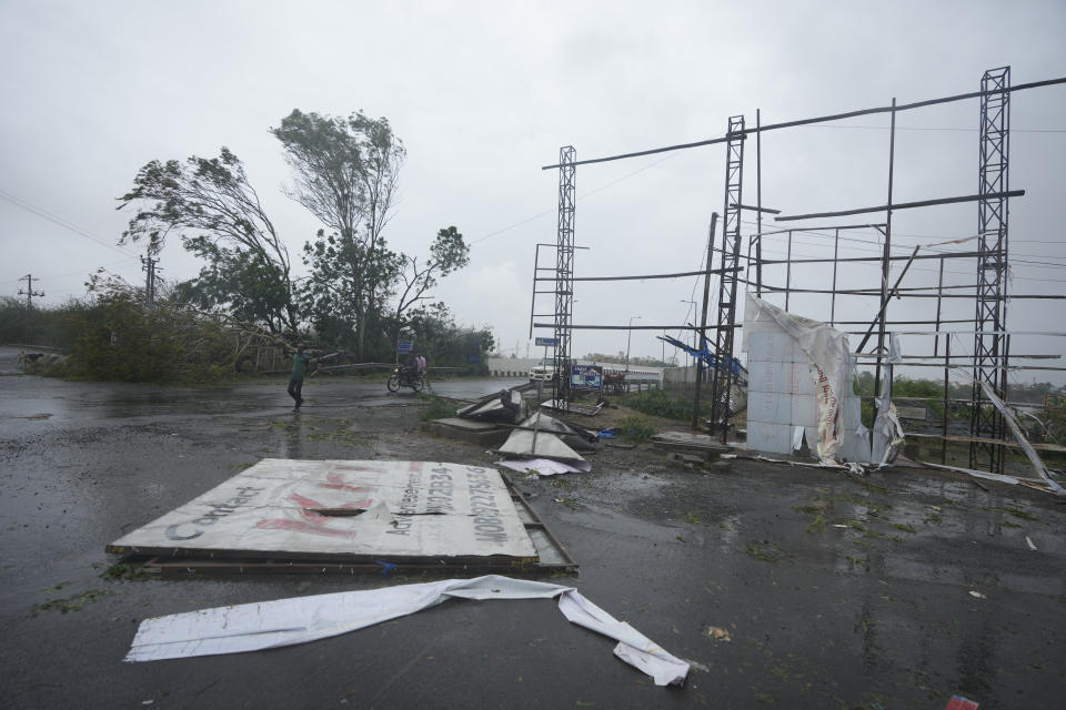 A big hoarding is seen on the ground following heavy winds and incessant rains after landfall of cyclone Biparjoy at Mandvi in Kutch district of Western Indian state of Gujarat, Friday, June 16, 2023. Cyclone Biparjoy knocked out power and threw shipping containers into the sea in western India on Friday before aiming its lashing winds and rain at part of Pakistan that suffered devastating floods last year. (AP Photo/Ajit Solanki)