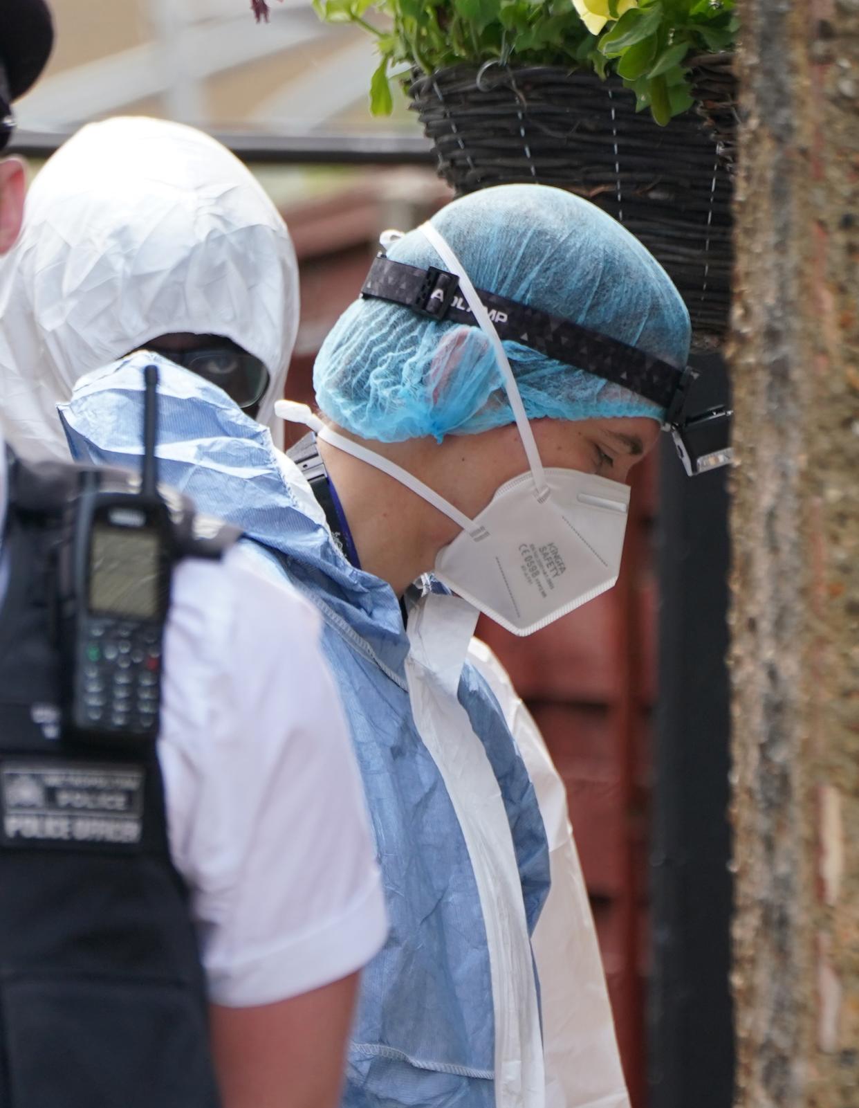 Investigators in Bedfont (Lucy North/PA Wire)