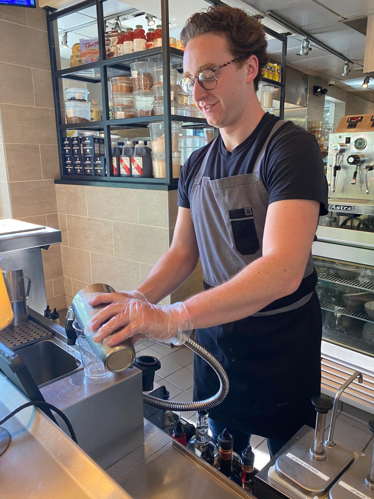 Northstar Café bartender Nick Brubaker makes a strawberry basil mojito May 16, the first day the business was included in Westerville’s Designated Outdoor Refreshment Area.