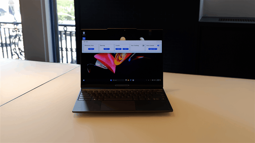 An animated photo showing the Lenovo Auto Twist laptop's screen swiveling almost 360 degrees on its hinge, then folding down when its display is facing out. In the end, the lid is flat on top of the keyboard with its screen facing up.