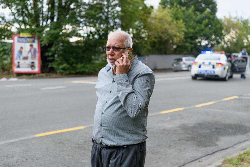 Ramzan Ali, thought to be the last man to get out of the Masjd Al Noor Mosque alive, waits in front of the mosque as he waits for news about his brother who was with him in the mosque on March 15, 2019 in Christchurch, New Zealand.